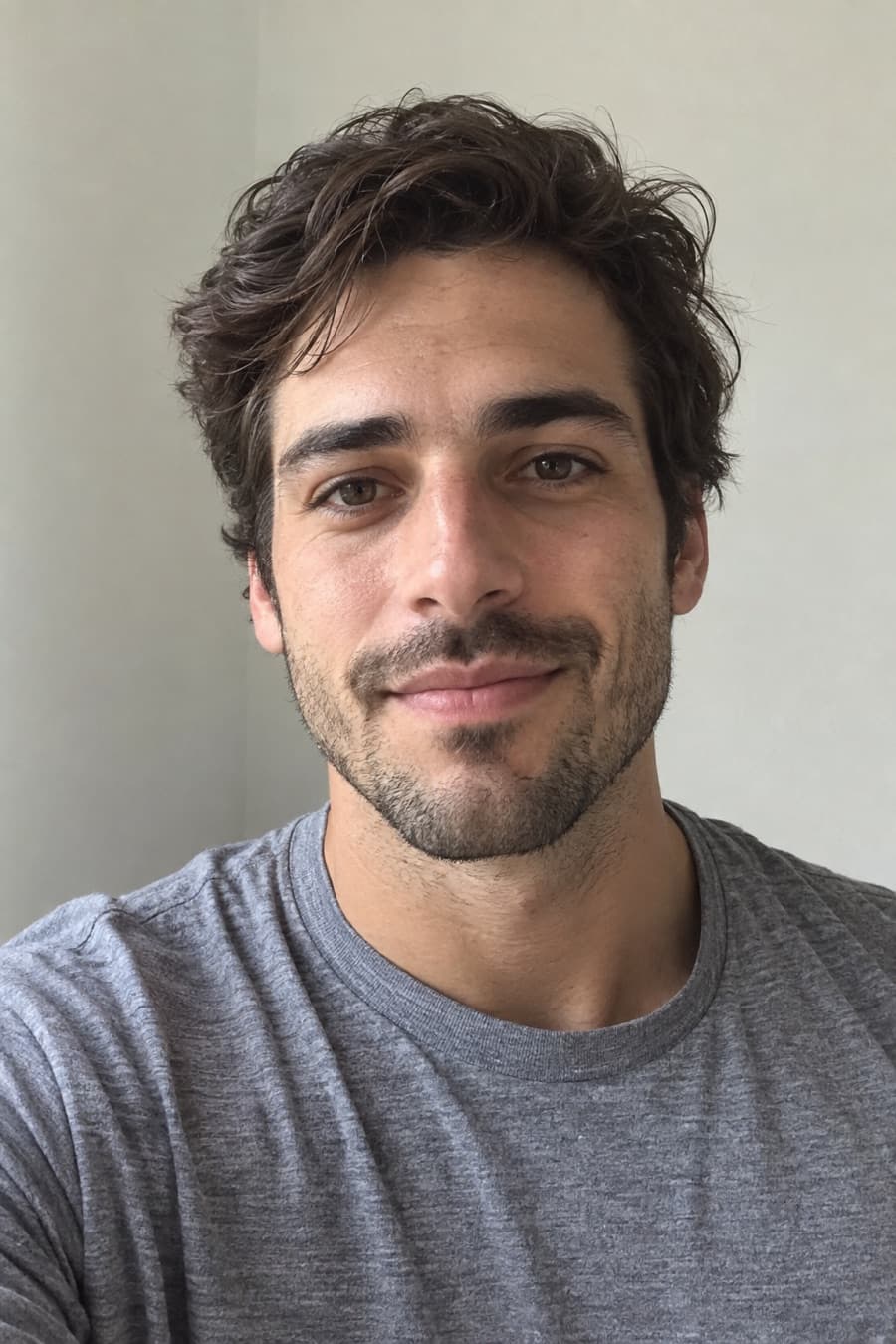 Ryan’s original selfie in a grey t-shirt